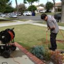 plumber conducts hydro-jetting